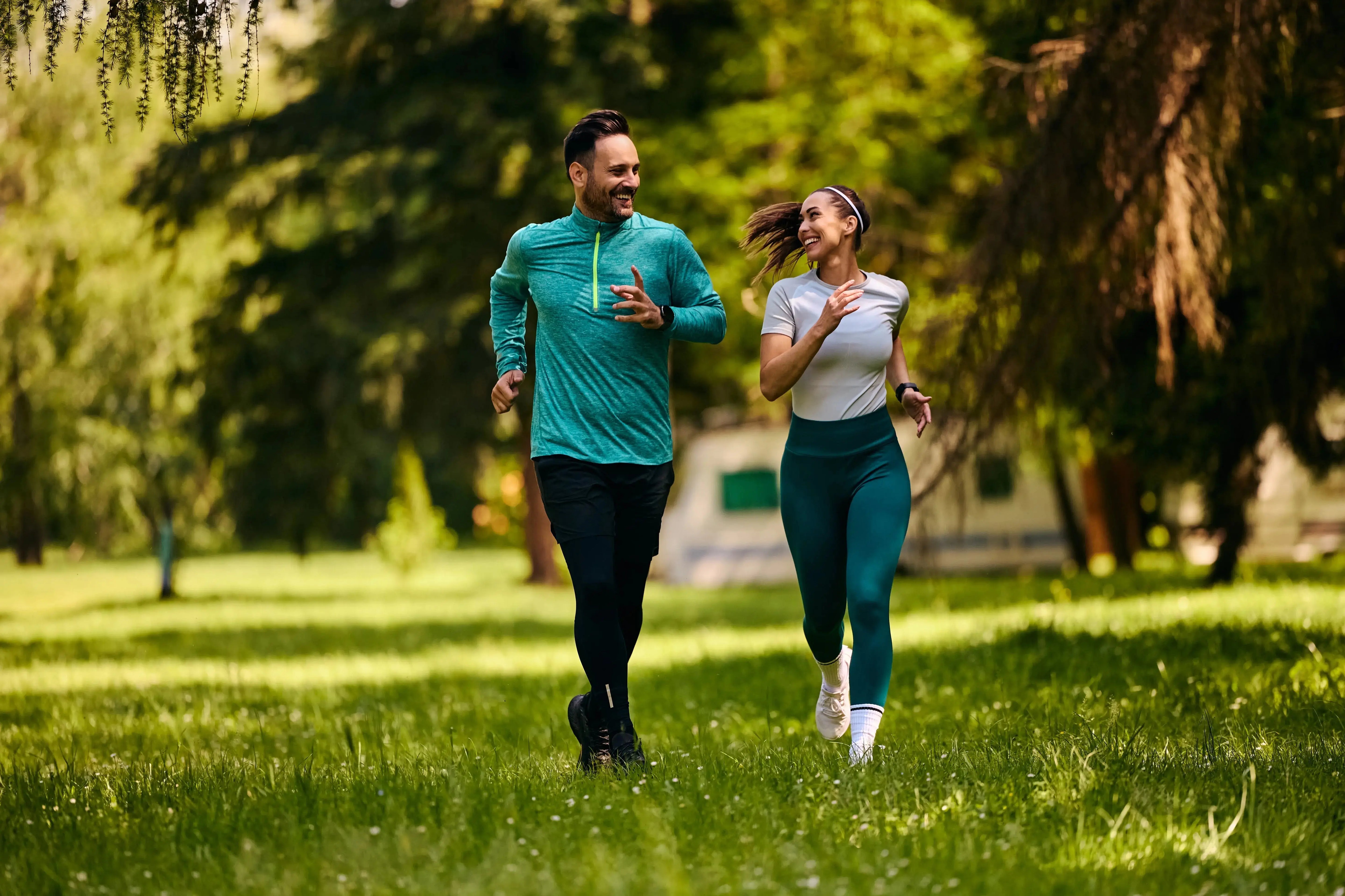 a couple relaxing in the park